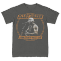Gray t-shirt with a graphic of a person playing guitar and text 'Riley Green Damn Country Music Tour' on a white background.
